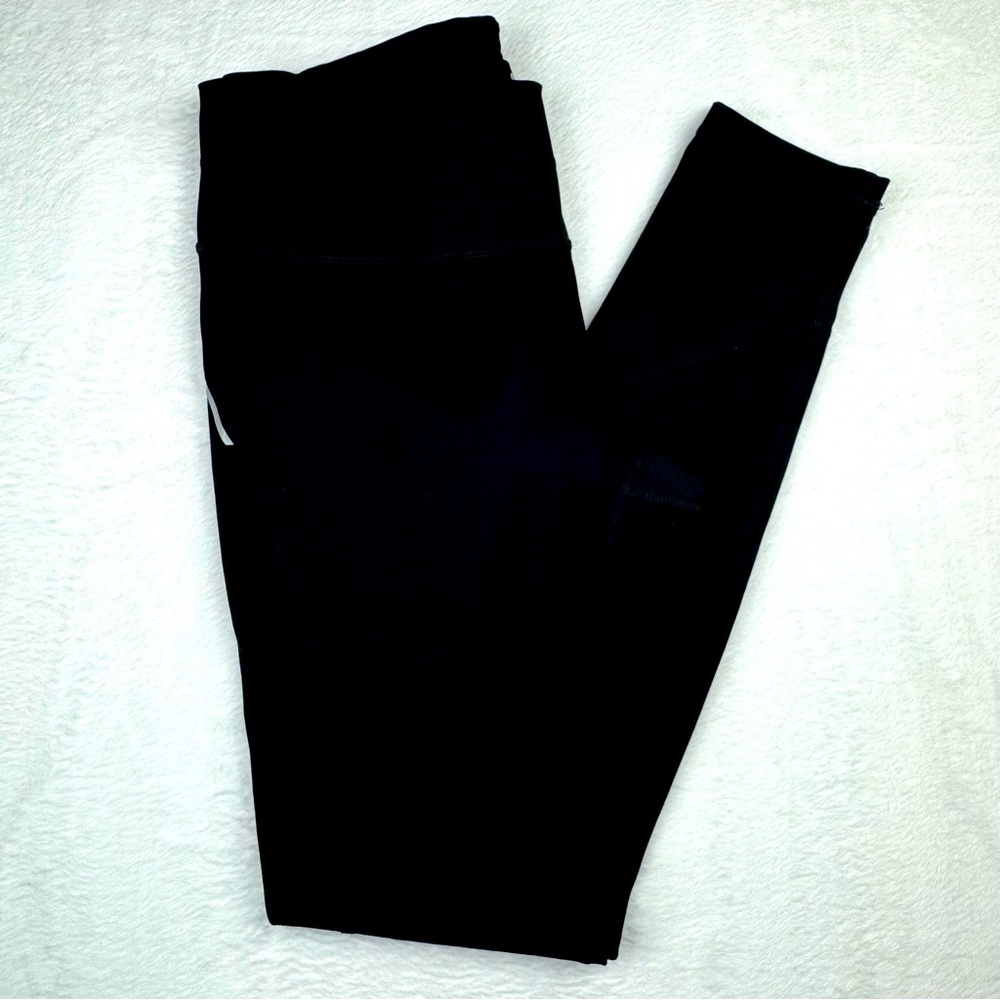 Athleta Woman’s Peak Tights. Black. Size M. Excellent condition. Rear zip pocket